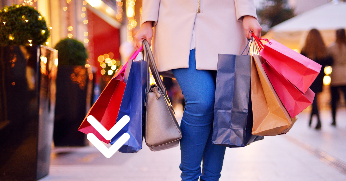 Mall shopper carrying shopping bags